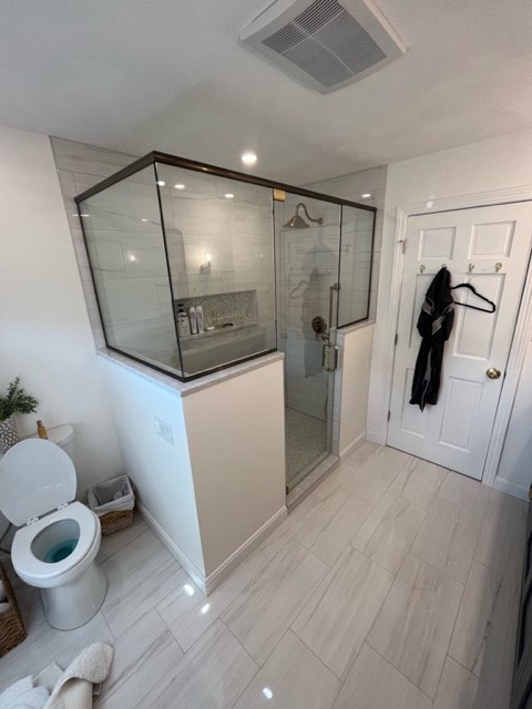 Shower Enclosure With Header And Channel Clear Brushed Bronze Pivot Door